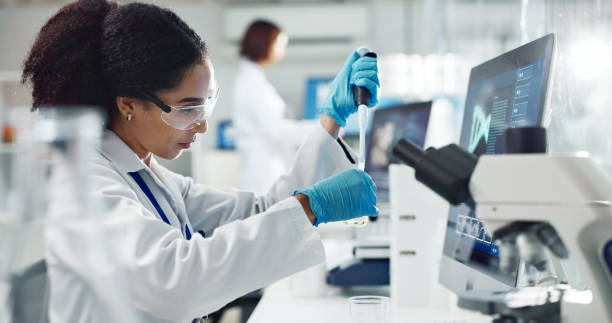 Laboratory technician reviewing analytical documentation for alluvi uk research peptides